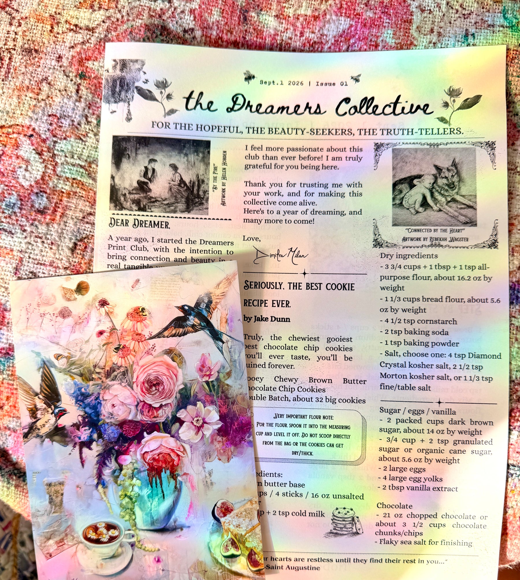 The first Dreamers Collective newspaper open over piano keys