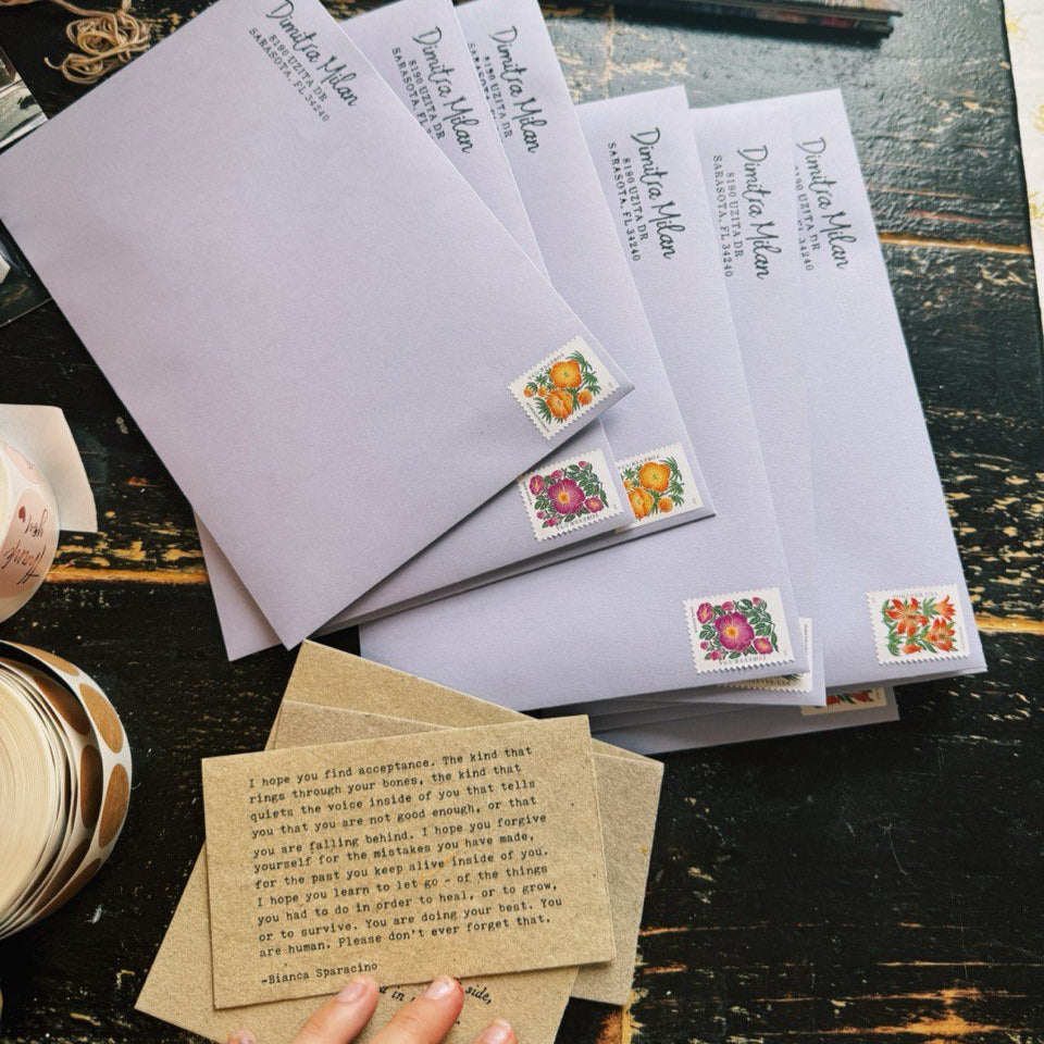 Lavender Dreamers Print Club envelopes and inspirational cards prepared for mailing.